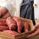 basket-of-colorful-sweet-potatoes-on-wooden-table-2026-09-22-03-40-53-utc